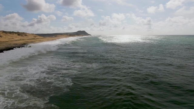 PUNTA GORDO EAST CAPE BCS MEXICO-2022: Waves Crashing Onto Sandy Beach Shoreline