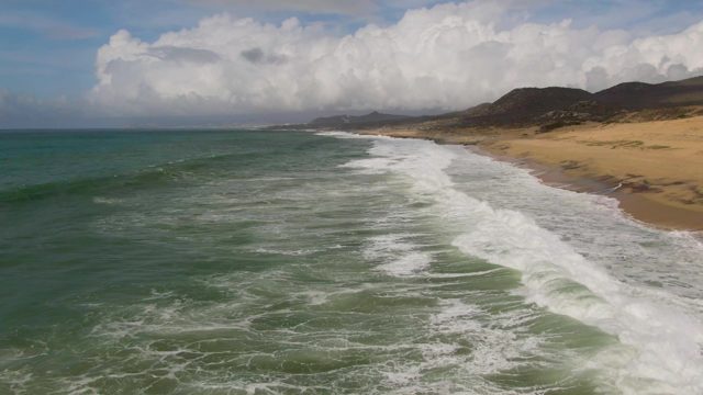 PUNTA GORDO EAST CAPE BCS MEXICO-2022: Ocean Waves Rolling Toward Sandy Beach