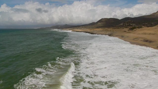 PUNTA GORDO EAST CAPE BCS MEXICO-2022: Waves Breaking on Sandy Coastal Shore