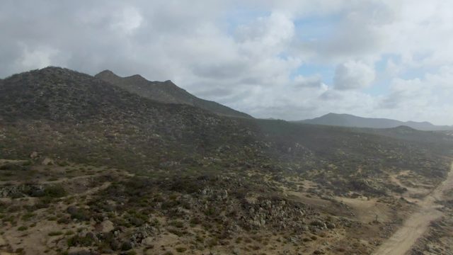 PUNTA GORDO EAST CAPE BCS MEXICO-2022: Rugged Mountain Terrain with Winding Dirt Road