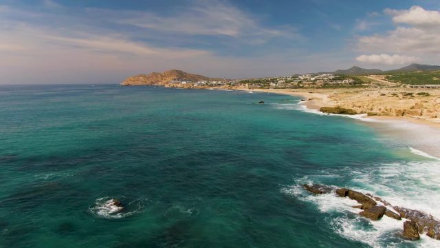 EL TULE LOS CABOS BCS MEXICO-2022: Waves Crashing on Coastal Rocks and Sandy Beach