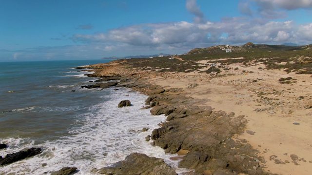 BUZZARDS EAST CAPE LOS CABOS BCS MEXICO-2022: Waves Crashing on Rocky Shoreline