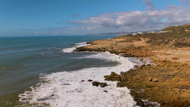 BUZZARDS EAST CAPE LOS CABOS BCS MEXICO-2022: Waves Breaking on Rocky Shoreline