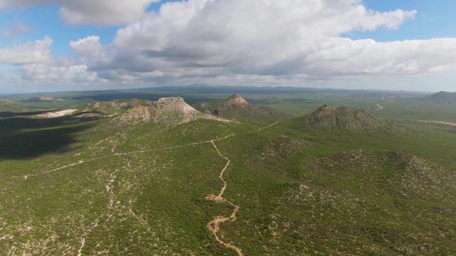 BUZZARDS EAST CAPE LOS CABOS BCS MEXICO-2022: Clouds Drifting Over Green Hilltops
