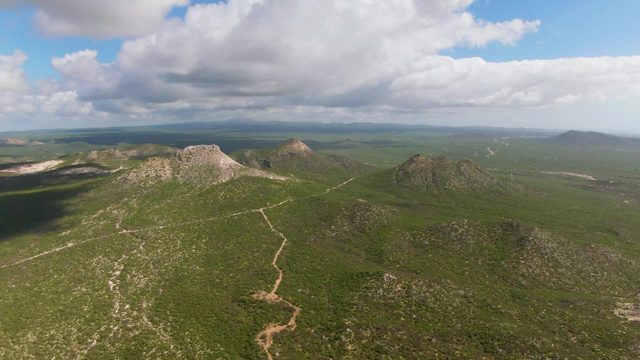 BUZZARDS EAST CAPE LOS CABOS BCS MEXICO-2022: Hilly Landscape with Winding Dirt Trail