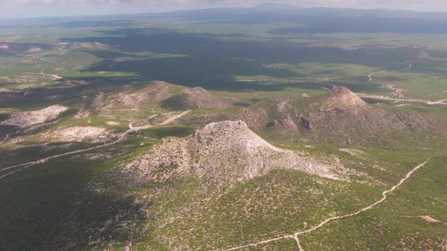 BUZZARDS EAST CAPE LOS CABOS BCS MEXICO-2022: Drifting Clouds Over Rugged Mountain Valley