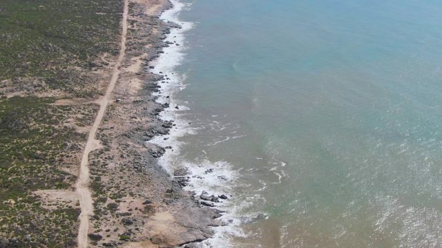 BUZZARDS EAST CAPE LOS CABOS BCS MEXICO-2022: Coastal Dirt Road Along Rocky Shoreline