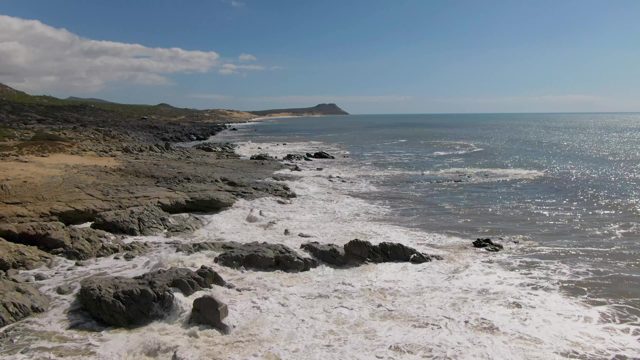 BUZZARDS EAST CAPE LOS CABOS BCS MEXICO-2022: Waves Crashing on Rocky Coastline