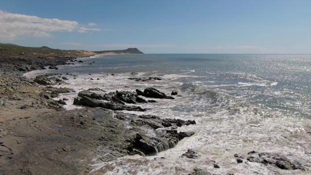 BUZZARDS EAST CAPE LOS CABOS BCS MEXICO-2022: Waves Crashing on Rocky Shoreline