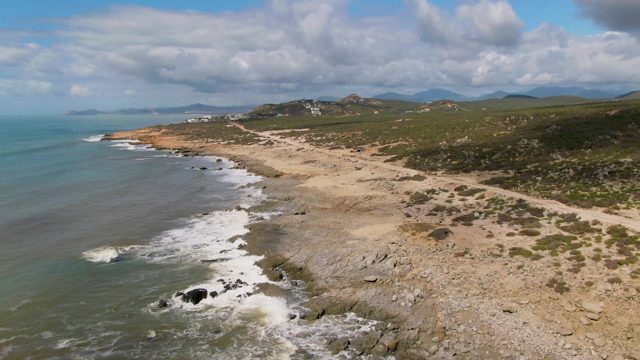 BUZZARDS EAST CAPE LOS CABOS BCS MEXICO-2022: Ocean Waves Crashing on Rocky Shore