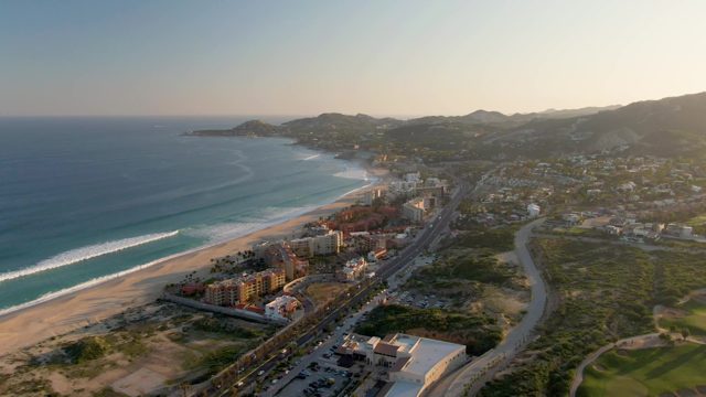 SAN JOSE DEL CABO BCS MEXICO-2022: Coastal Highway and Sandy Beach with Ocean Waves