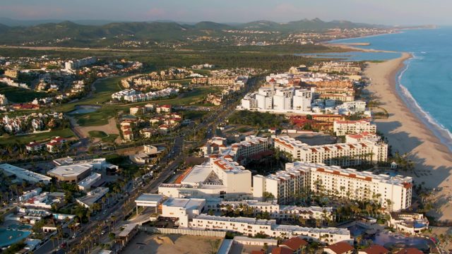 SAN JOSE DEL CABO BCS MEXICO-2022: Coastal City Traffic and Beachfront Buildings
