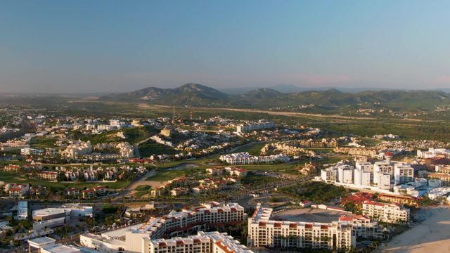 SAN JOSE DEL CABO BCS MEXICO-2022: Coastal Cityscape with Intermittent Tower Visibility