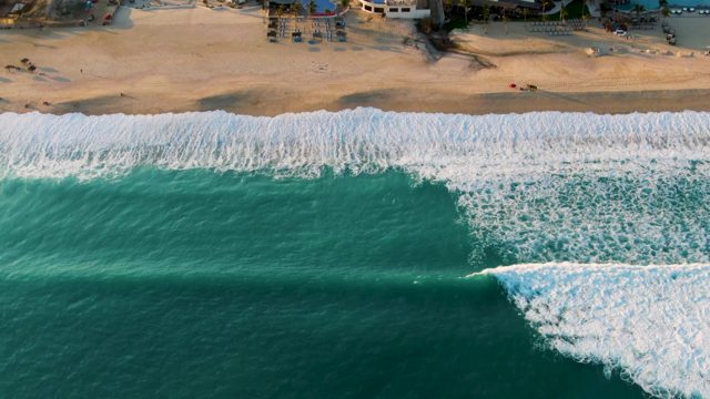 SAN JOSE DEL CABO BCS MEXICO-2022: Waves Rolling Toward the Sandy Shore