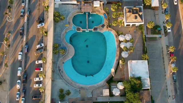 SAN JOSE DEL CABO BCS MEXICO-2022: Heart-shaped Pool and Adjacent Street From Above
