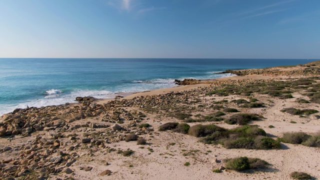 BUZZARDS EAST CAPE LOS CABOS BCS MEXICO-2022: Rocky Shore and Sandy Beach by the Ocean