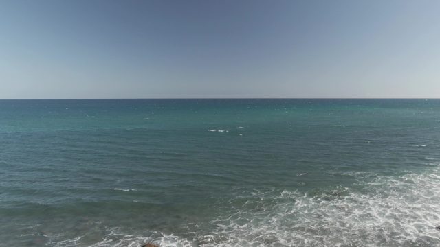COSTA AZUL LOS CABOS BCS MEXICO-2022: Waves Rolling In on Rocky Beach