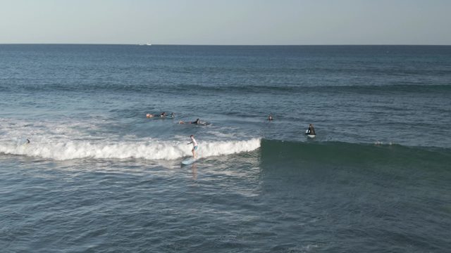 COSTA AZUL LOS CABOS BCS MEXICO-2022: Surfers Riding and Paddling in Ocean Waves