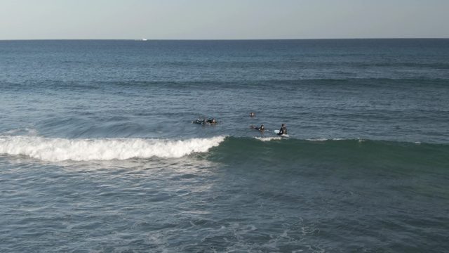 COSTA AZUL LOS CABOS BCS MEXICO-2022: Surfers Paddling in Ocean Waves