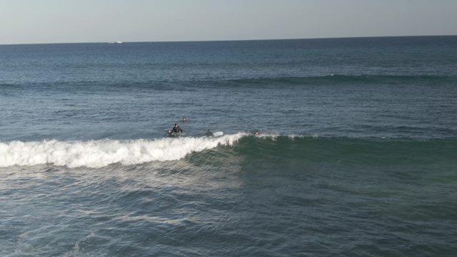 COSTA AZUL LOS CABOS BCS MEXICO-2022: Surfers Catching a Breaking Wave in the Ocean