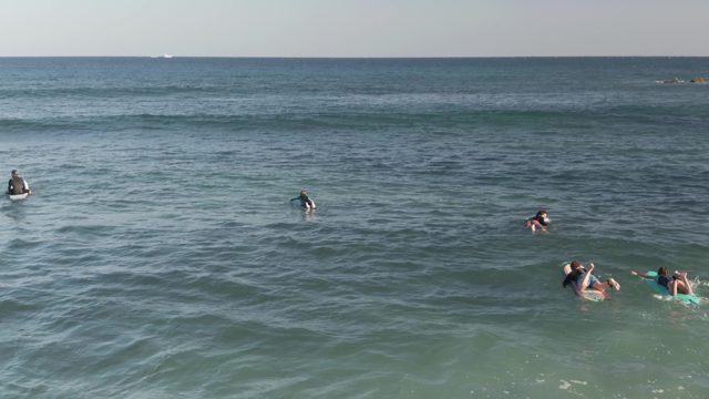 COSTA AZUL LOS CABOS BCS MEXICO-2022: Surfers and Bodyboarders Paddling in the Ocean
