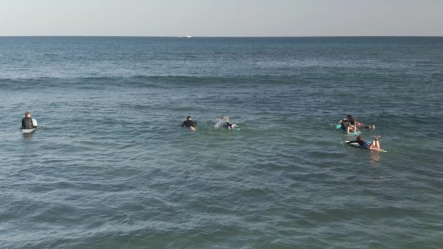 COSTA AZUL LOS CABOS BCS MEXICO-2022: Surfers Waiting for Waves in the Ocean