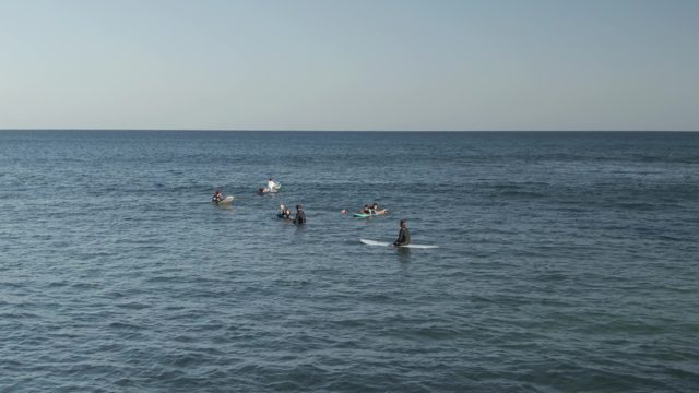 COSTA AZUL LOS CABOS BCS MEXICO-2022: Surfers and Bodyboarders Waiting in the Ocean