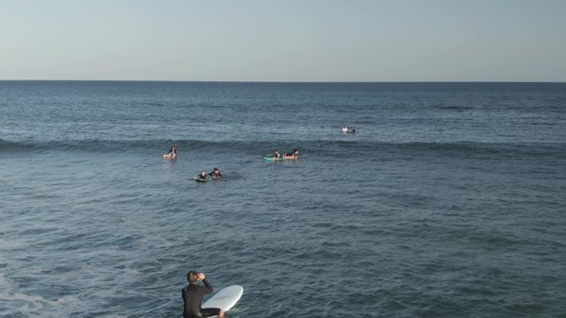 COSTA AZUL LOS CABOS BCS MEXICO-2022: Surfers Paddling and Waiting for Waves in Ocean