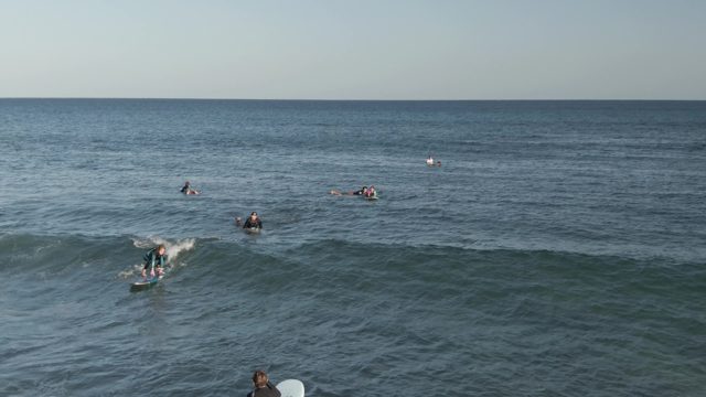 COSTA AZUL LOS CABOS BCS MEXICO-2022: Surfers Paddling and Riding Waves in the Ocean