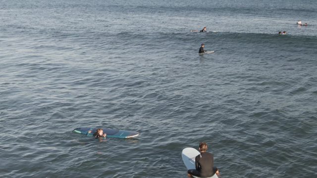 COSTA AZUL LOS CABOS BCS MEXICO-2022: Surfers and Swimmers Waiting in the Ocean