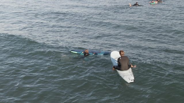 COSTA AZUL LOS CABOS BCS MEXICO-2022: Surfers Paddling in the Ocean