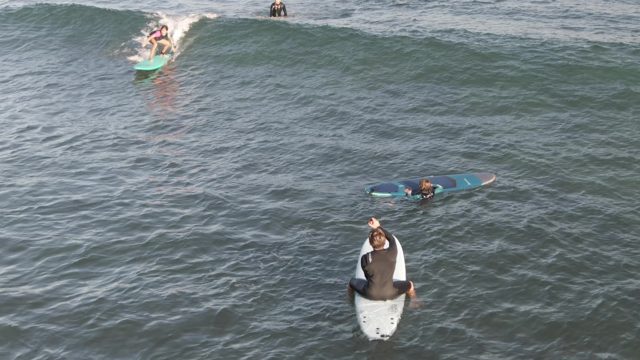COSTA AZUL LOS CABOS BCS MEXICO-2022: Surfers Paddling and Catching Waves in Ocean