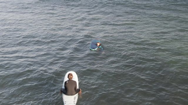 COSTA AZUL LOS CABOS BCS MEXICO-2022: Two Surfers Paddling in Calm Ocean Waters