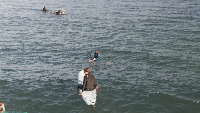 COSTA AZUL LOS CABOS BCS MEXICO-2022: Surfers Paddling in Ocean Waters
