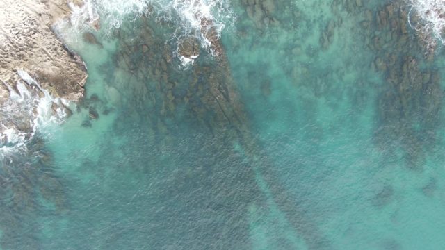 BUZZARDS EAST CAPE LOS CABOS BCS MEXICO-2022: Waves Retreating From Rocky Shoreline