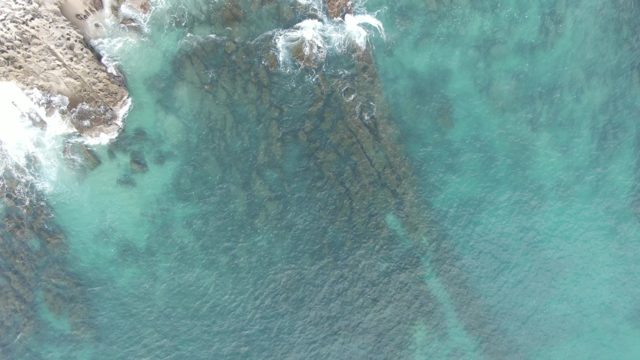 BUZZARDS EAST CAPE LOS CABOS BCS MEXICO-2022: Waves Crashing Against Rocky Coastline