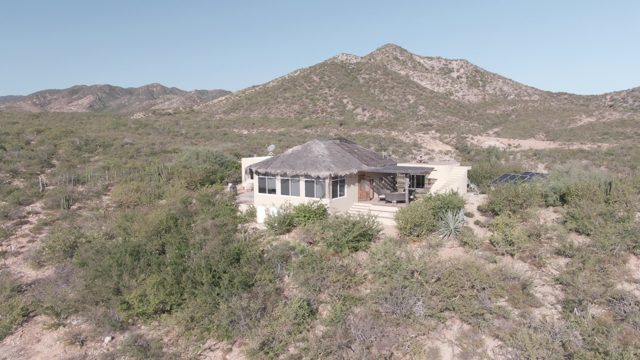 CABO PULMO BCS MEXICO-2022: Desert House Amidst Cacti and Distant Mountains