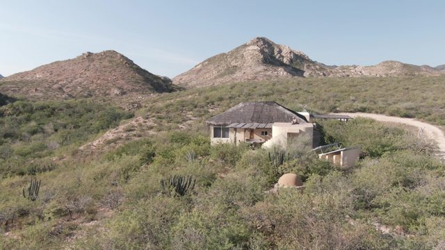 CABO PULMO BCS MEXICO-2022: Desert Cabin with Cacti and Distant Mountains