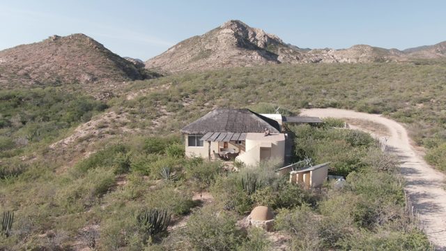 CABO PULMO BCS MEXICO-2022: Desert House with Vehicle on Dirt Road