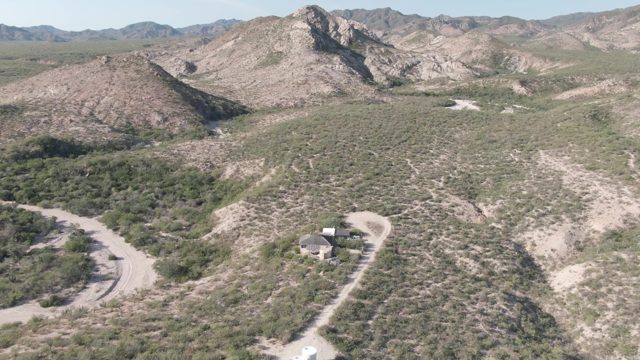 CABO PULMO BCS MEXICO-2022: Vehicles Moving on Dirt Roads near Desert House