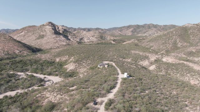 CABO PULMO BCS MEXICO-2022: Vehicle Moving on Winding Arid Road