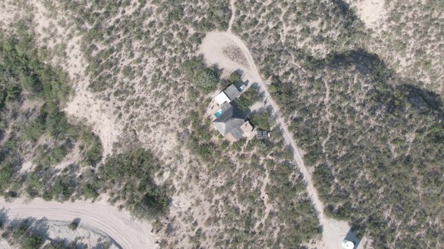 CABO PULMO BCS MEXICO-2022: Desert House and Passing Car on Dirt Road