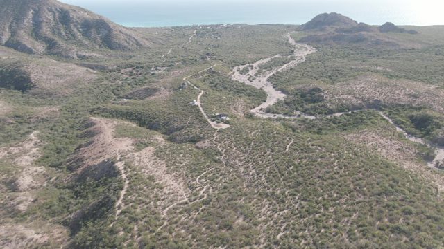 CABO PULMO BCS MEXICO-2022: Vehicle Traveling on Winding Mountain Dirt Road