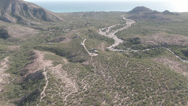 CABO PULMO BCS MEXICO-2022: Vehicle Moving on Winding Mountain Path