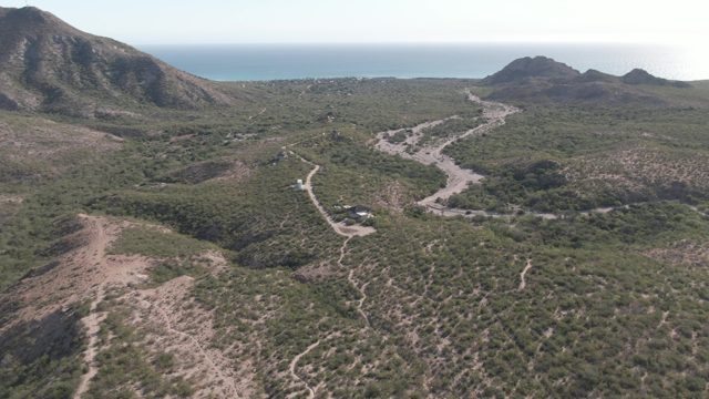 CABO PULMO BCS MEXICO-2022: Vehicle Driving on Winding Coastal Dirt Road