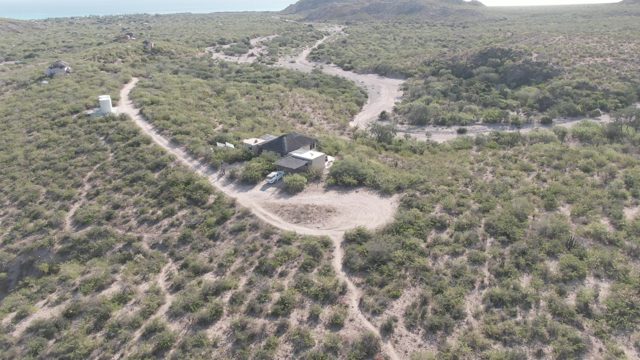CABO PULMO BCS MEXICO-2022: Trailer Traveling on a Hillside Dirt Road