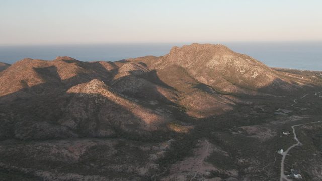 CABO PULMO BCS MEXICO-2022: Sunlight Shifting Over Mountain Ridges and Sea