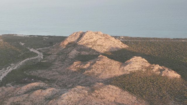 CABO PULMO BCS MEXICO-2022: Winding Road Through Rocky Hills and Green Slopes