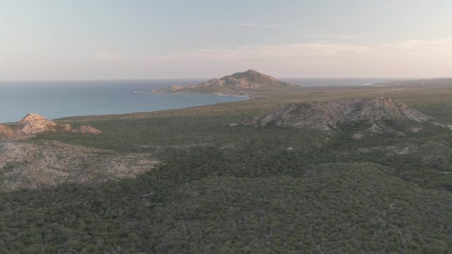 CABO PULMO BCS MEXICO-2022: Aerial Pan of Coastal Hills and Ocean