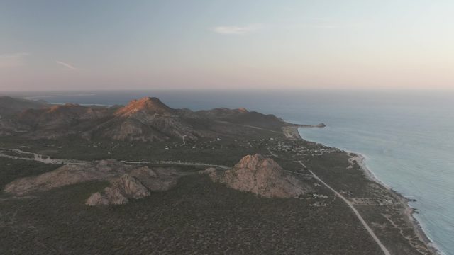CABO PULMO BCS MEXICO-2022: Coastal Mountain Road with Moving Vehicle Aerial
